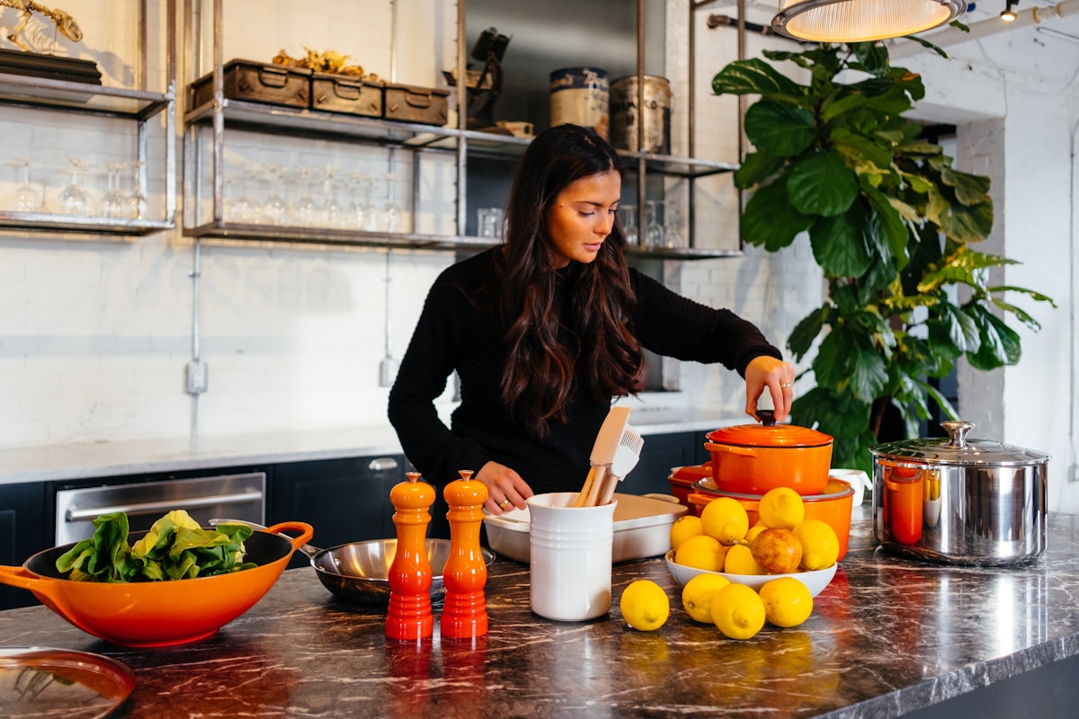 Maria preparing organic vegetables in her certified kitchen